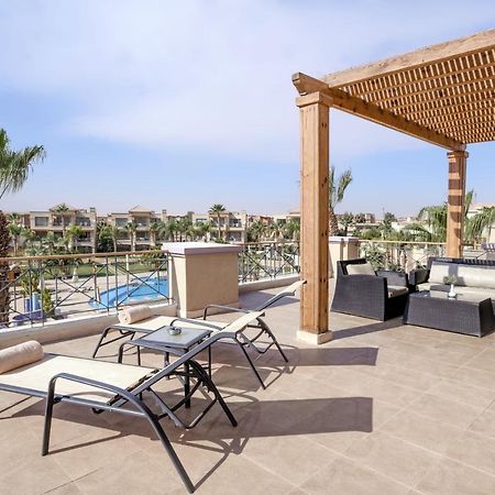 עיין סוחנה Jaz Little Venice Golf Resort מראה חיצוני תמונה Rooftop at the Hilton Sharm El Sheikh